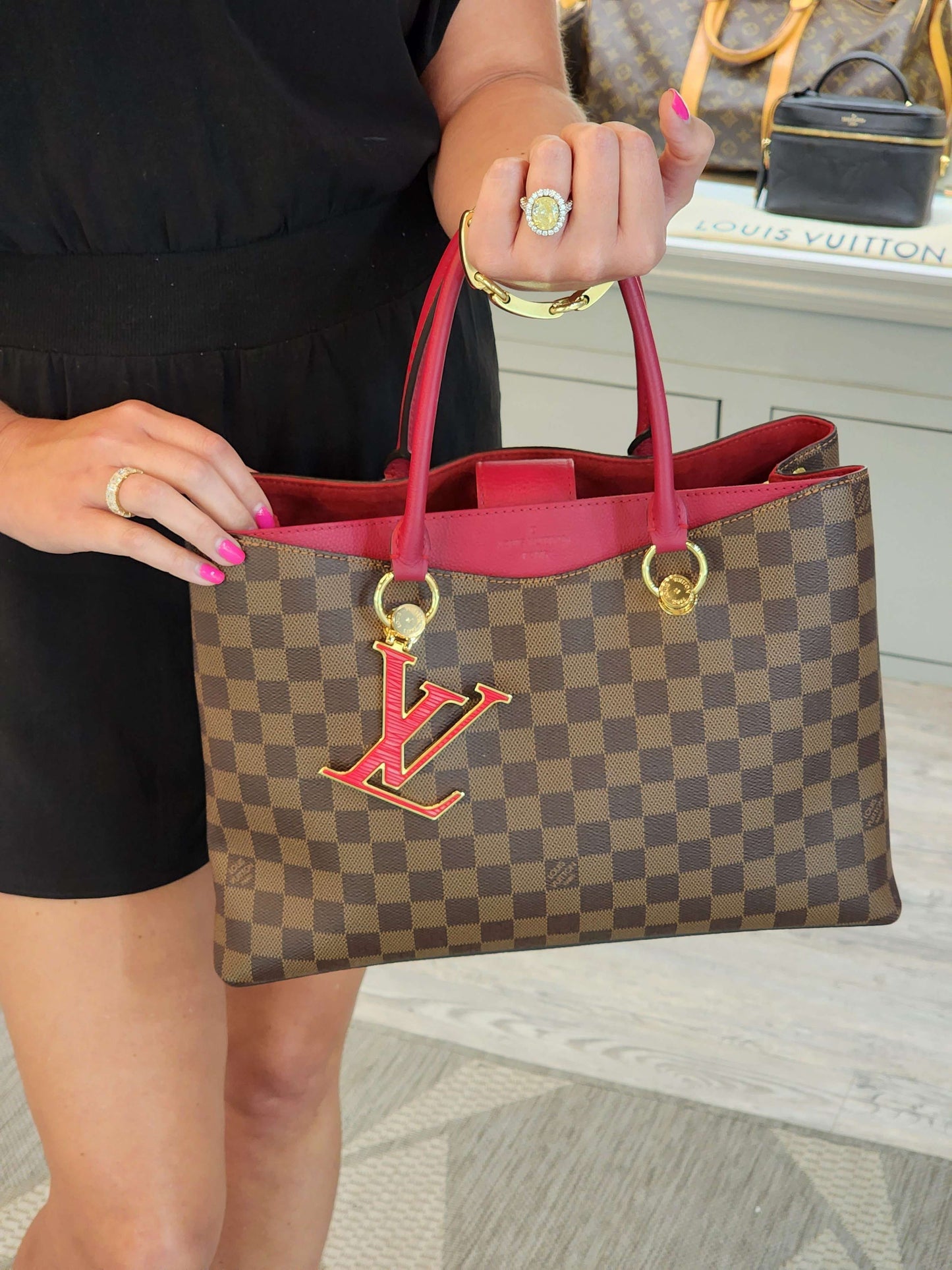LOUIS VUITTON
Damier Ebene LV Riverside Lie De Vin Handbag