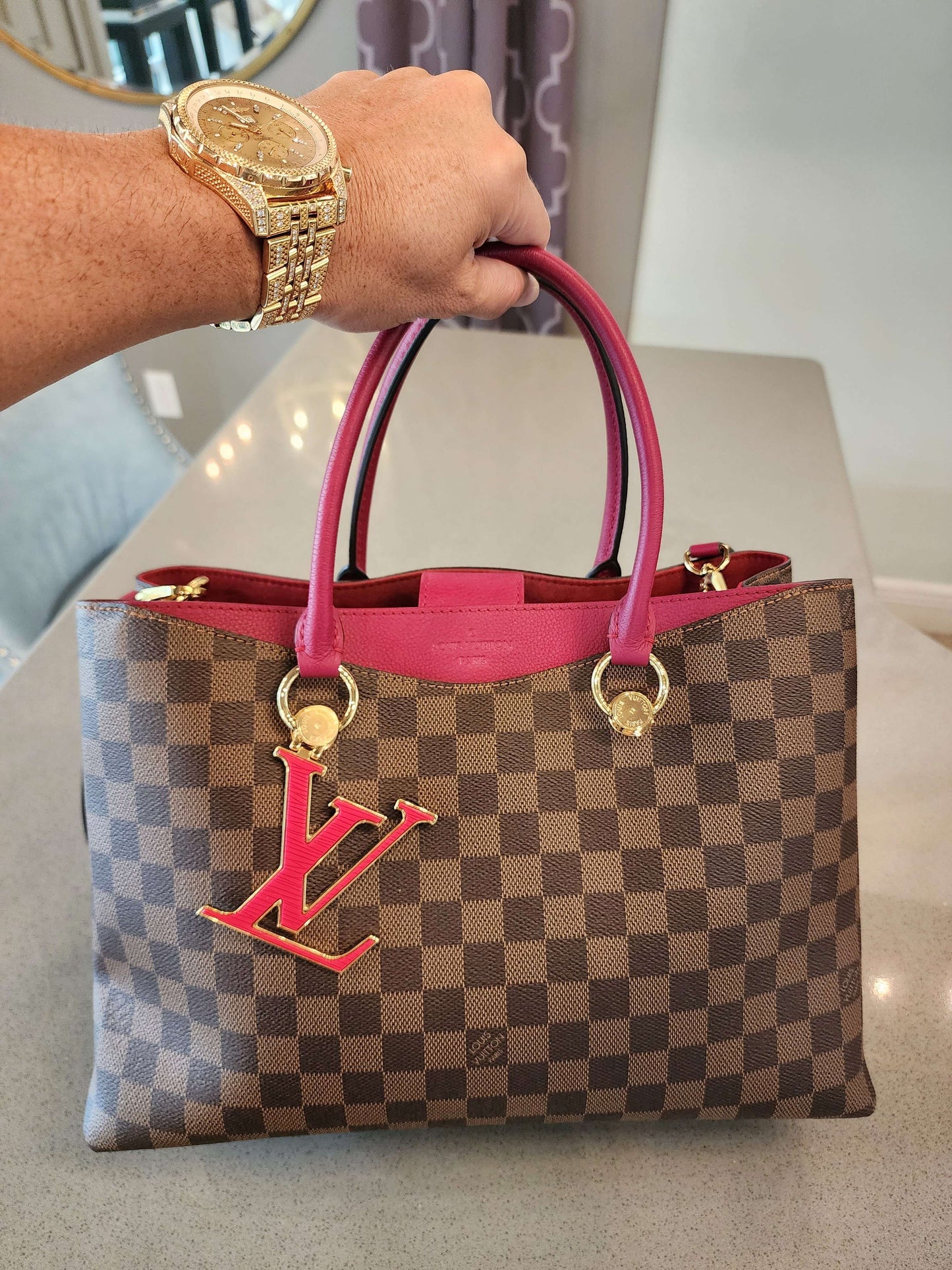 LOUIS VUITTON
Damier Ebene LV Riverside Lie De Vin Handbag