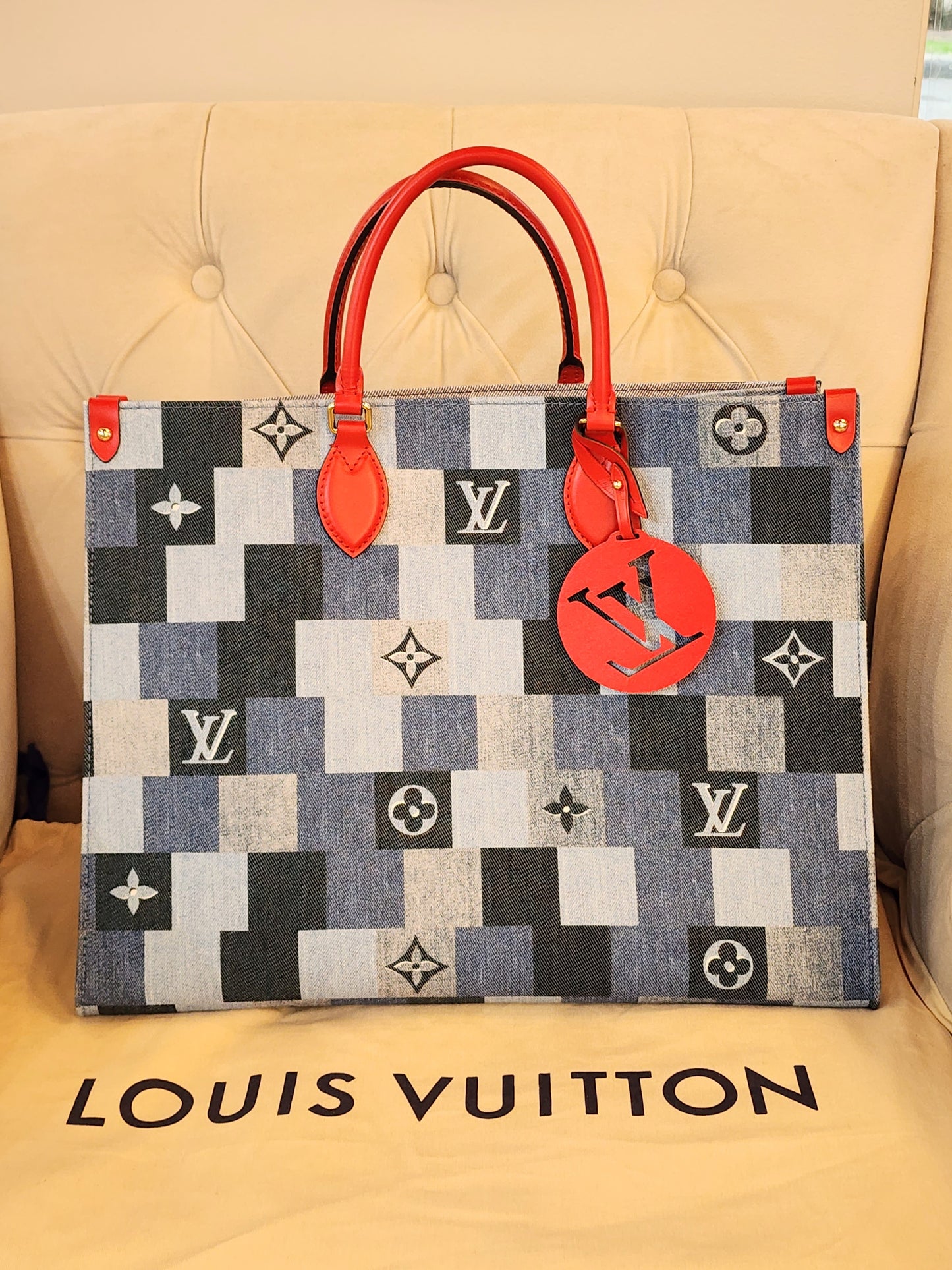LOUIS VUITTON
Denim Damier Monogram OnTheGo in Blue Rouge
