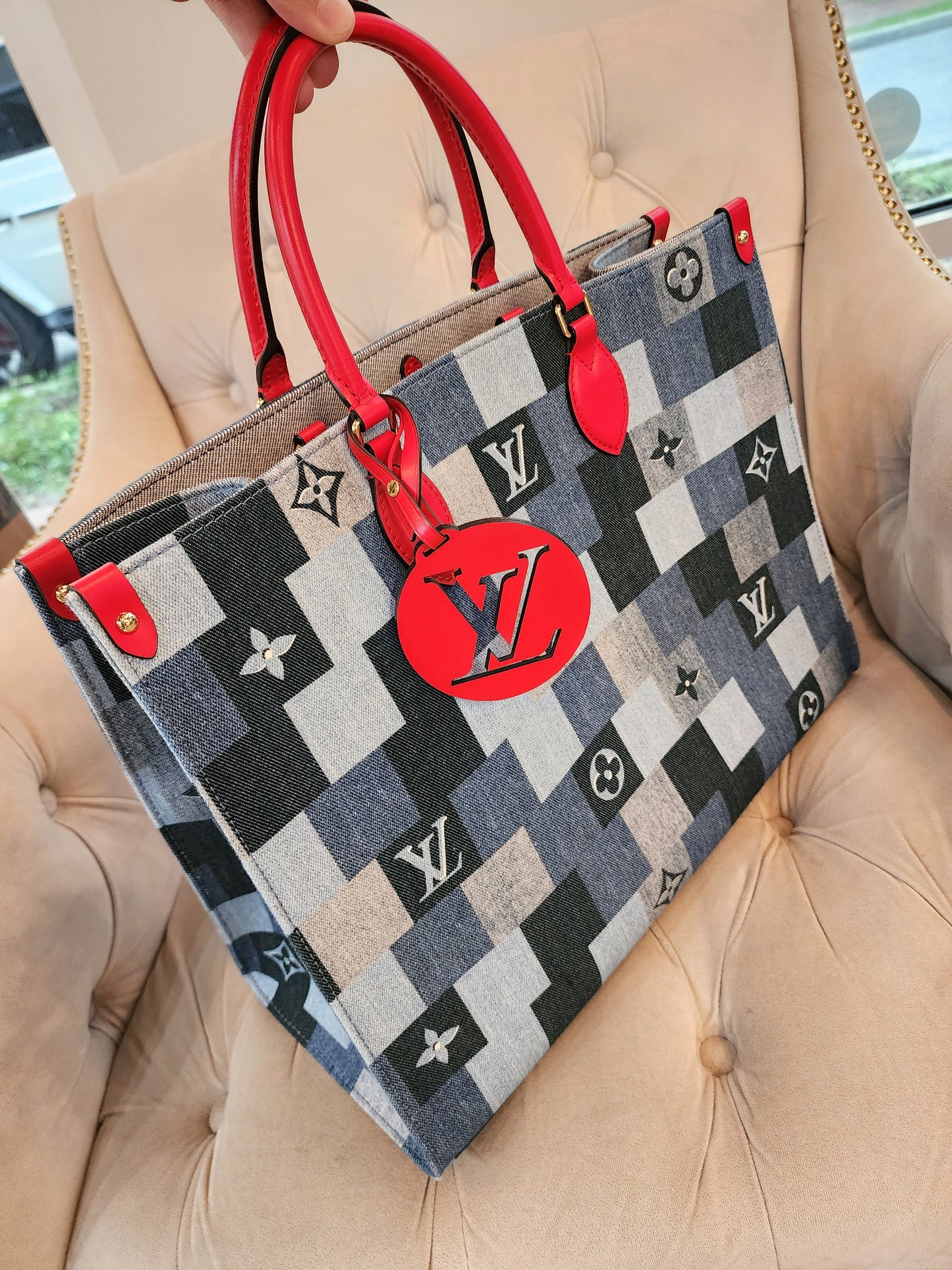 LOUIS VUITTON
Denim Damier Monogram OnTheGo in Blue Rouge