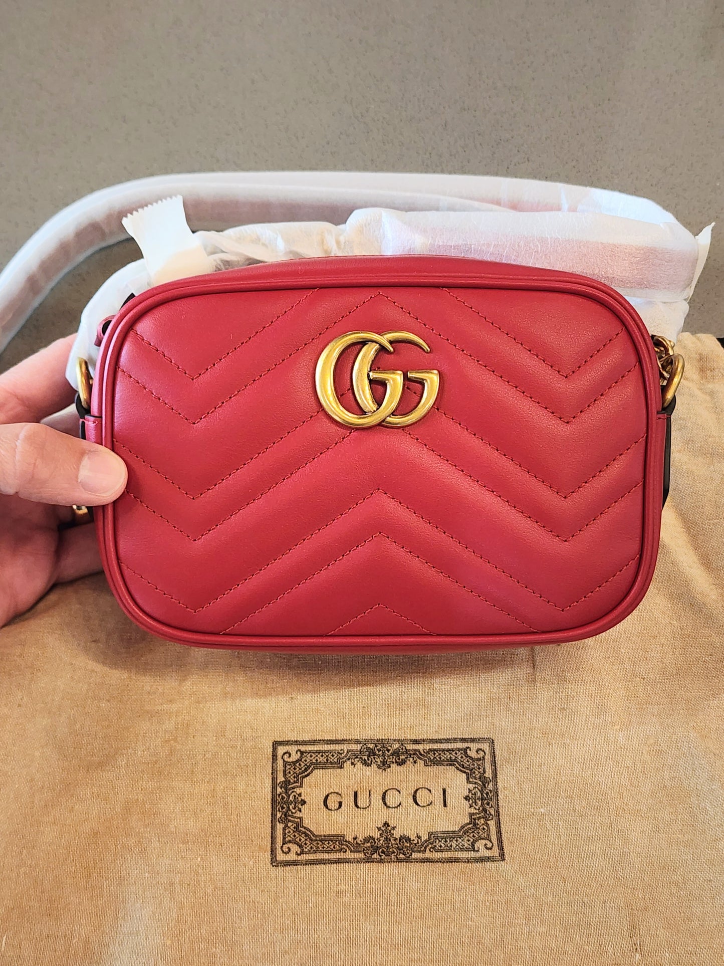 GUCCI
Calfskin Matelasse Mini GG Marmont Chain Shoulder Bag in Red