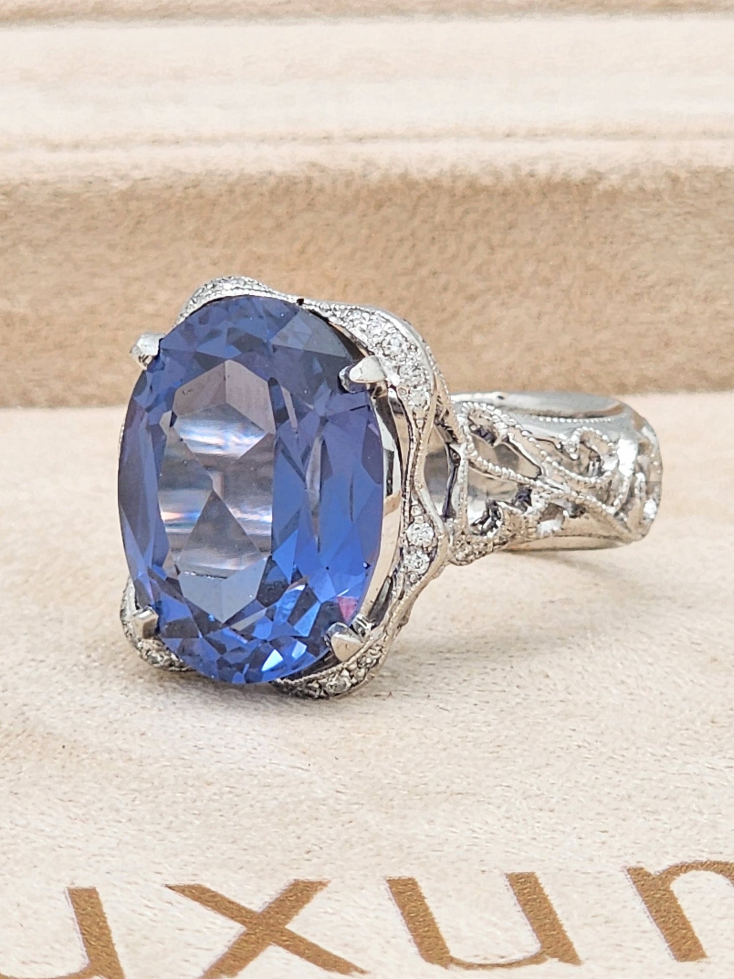 Estate Custom Platinum Diamond Setting Displaying a 12 x 16mm Oval Cut Synthetic Alexandrite