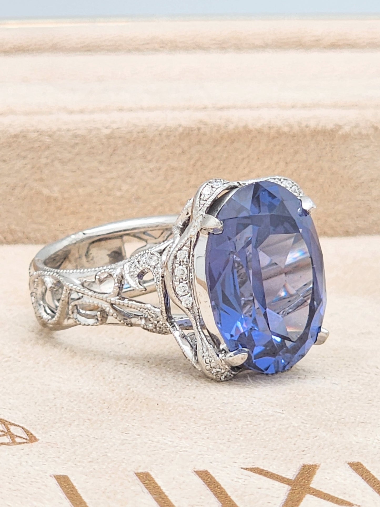 Estate Custom Platinum Diamond Setting Displaying a 12 x 16mm Oval Cut Synthetic Alexandrite