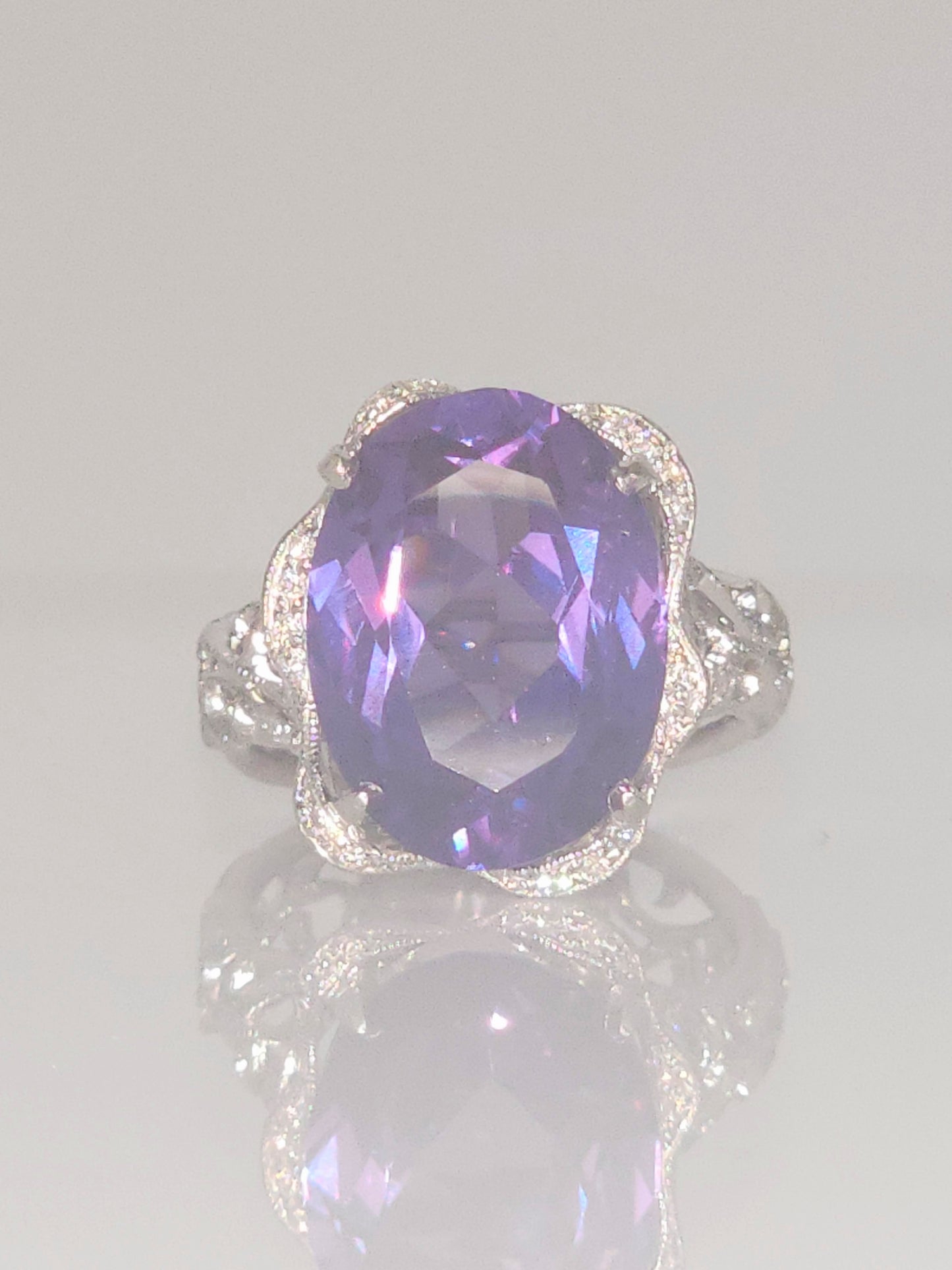 Estate Custom Platinum Diamond Setting Displaying a 12 x 16mm Oval Cut Synthetic Alexandrite