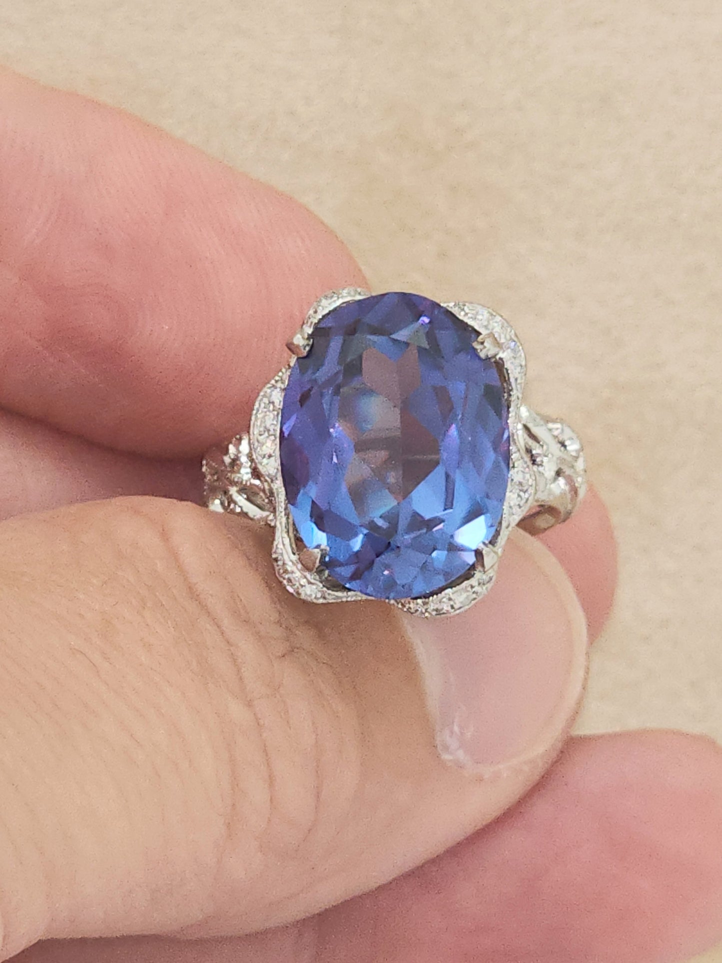 Estate Custom Platinum Diamond Setting Displaying a 12 x 16mm Oval Cut Synthetic Alexandrite