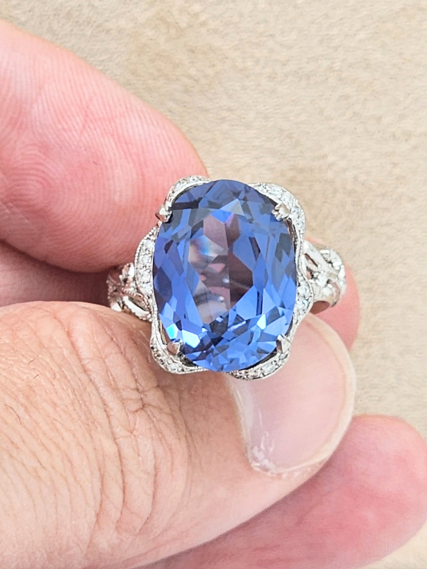 Estate Custom Platinum Diamond Setting Displaying a 12 x 16mm Oval Cut Synthetic Alexandrite