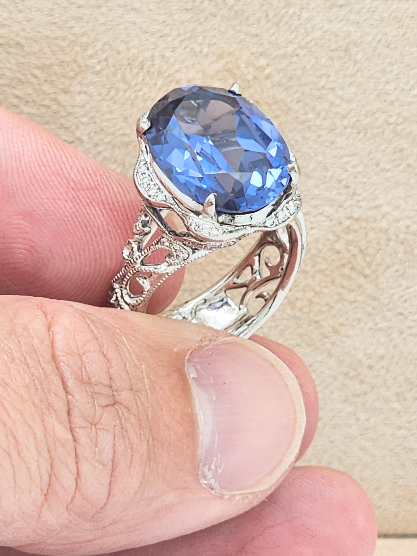 Estate Custom Platinum Diamond Setting Displaying a 12 x 16mm Oval Cut Synthetic Alexandrite