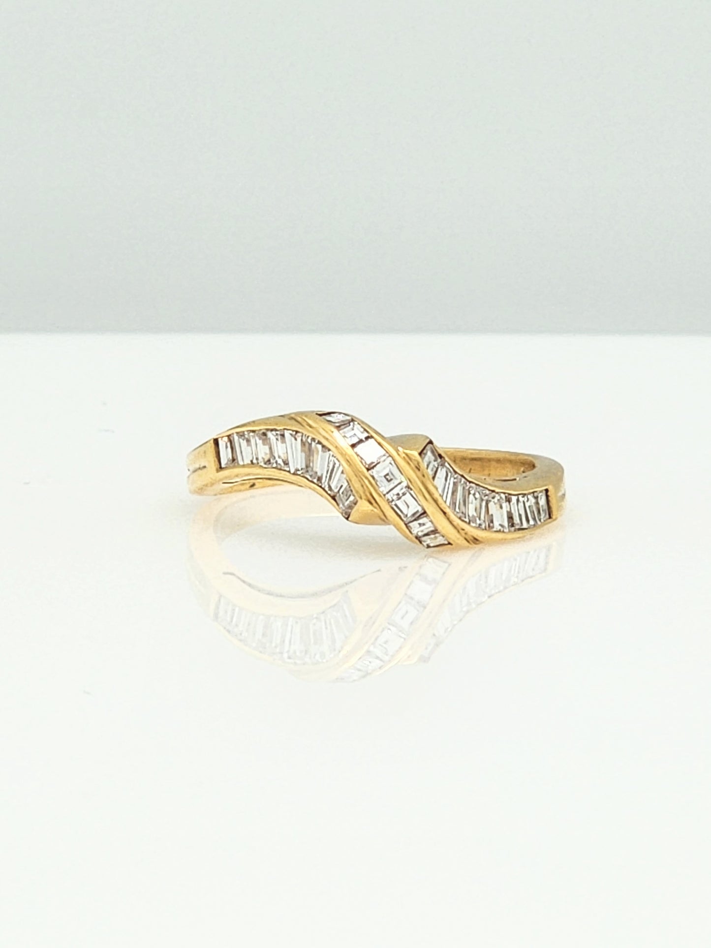 Beautiful .75 Carat Baguette and Carre Cut Diamond Wave Ring in 18KYG