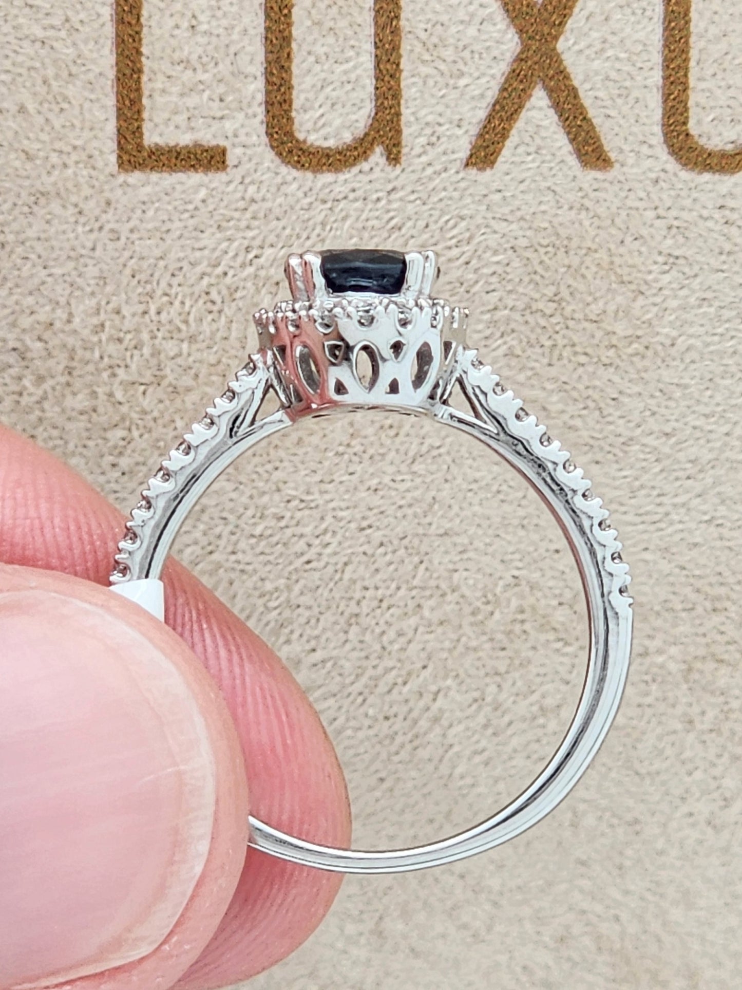 1.52 Carat Oval Blue Sapphire in 14KWG Diamond Halo Setting!