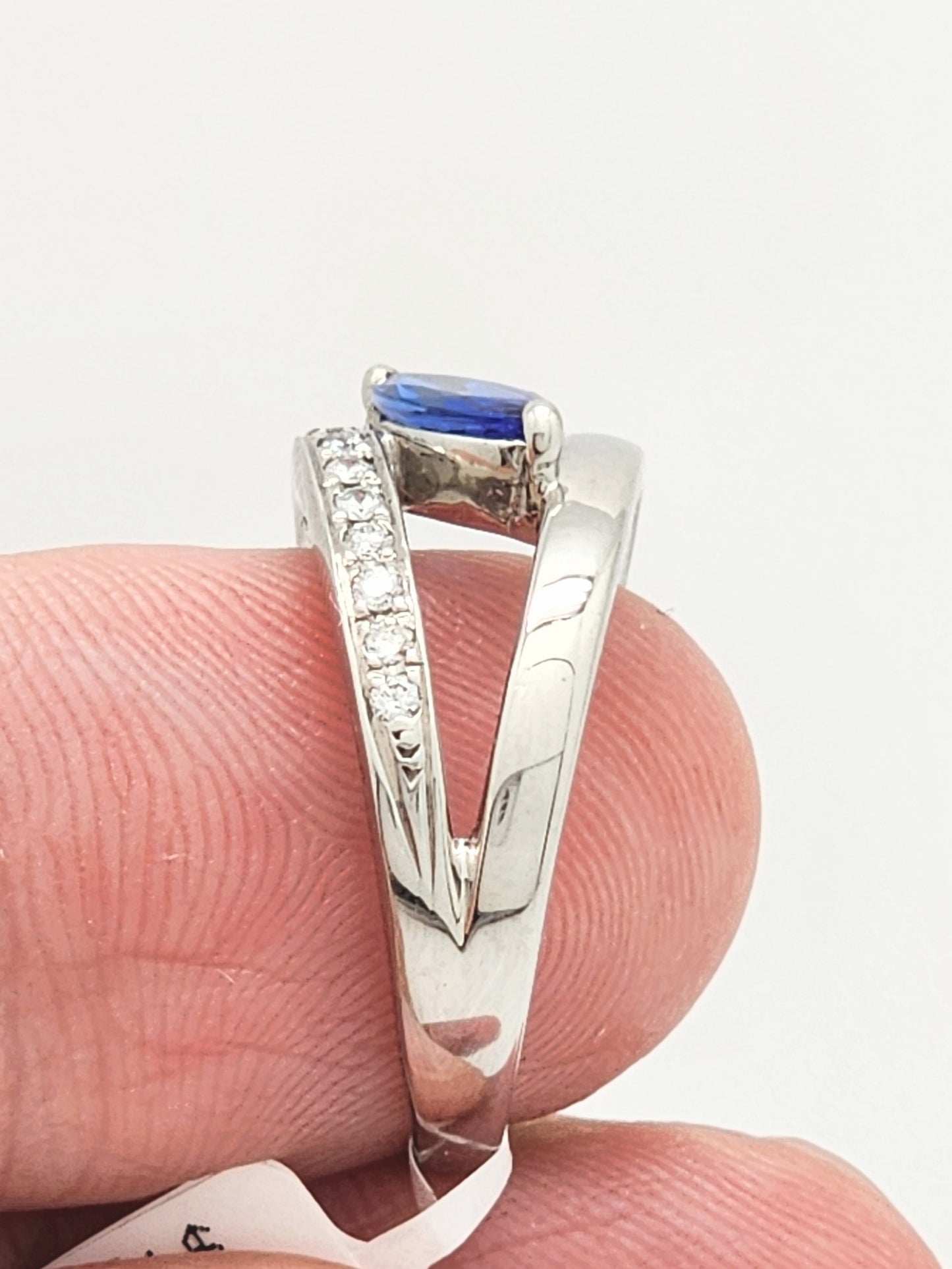 0.72 CARAT TANZANITE and DIAMOND RING in PLATINUM
