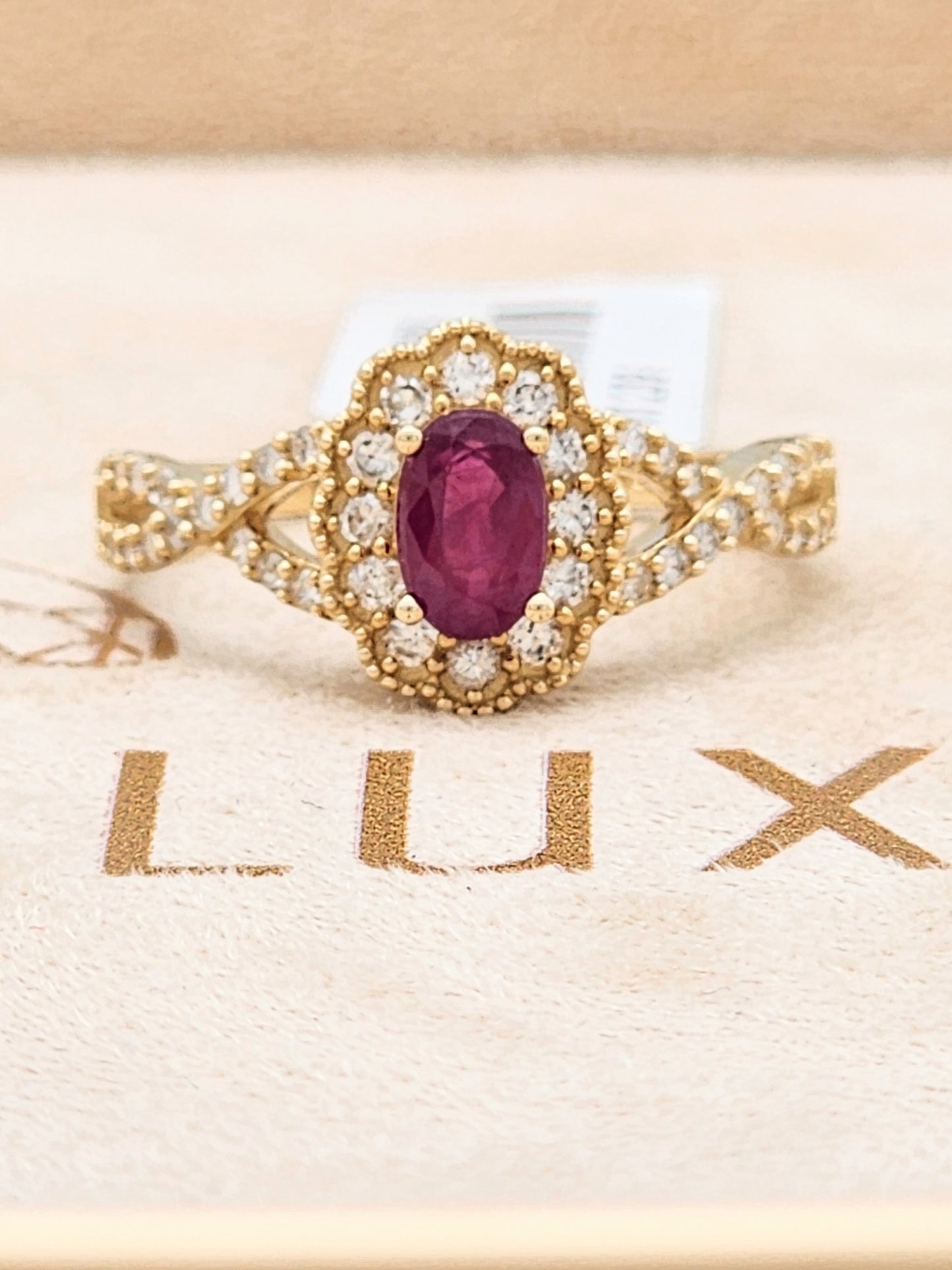 1.08 Total Carat Ruby and Diamond Halo Ring in 14KYG!