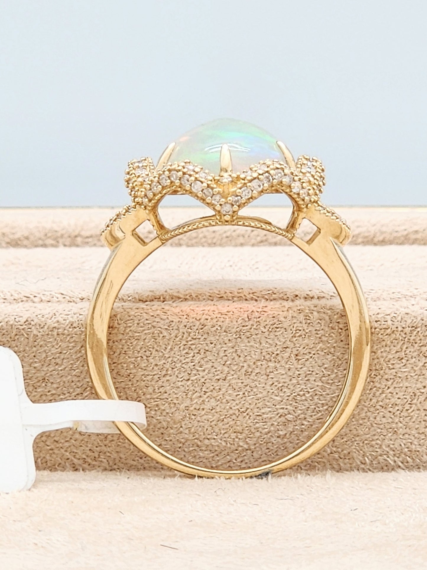 3.33 Total Carat Opal and Diamond Halo Ring in 14KYG!