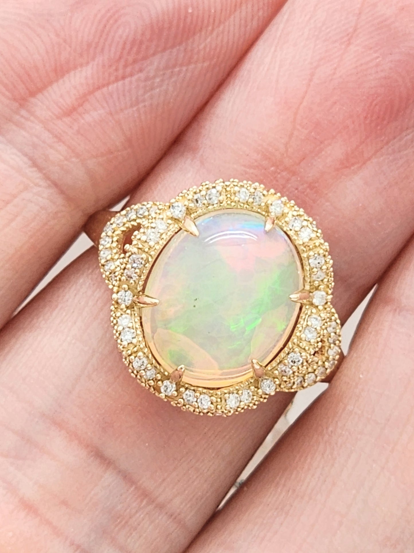 3.33 Total Carat Opal and Diamond Halo Ring in 14KYG!
