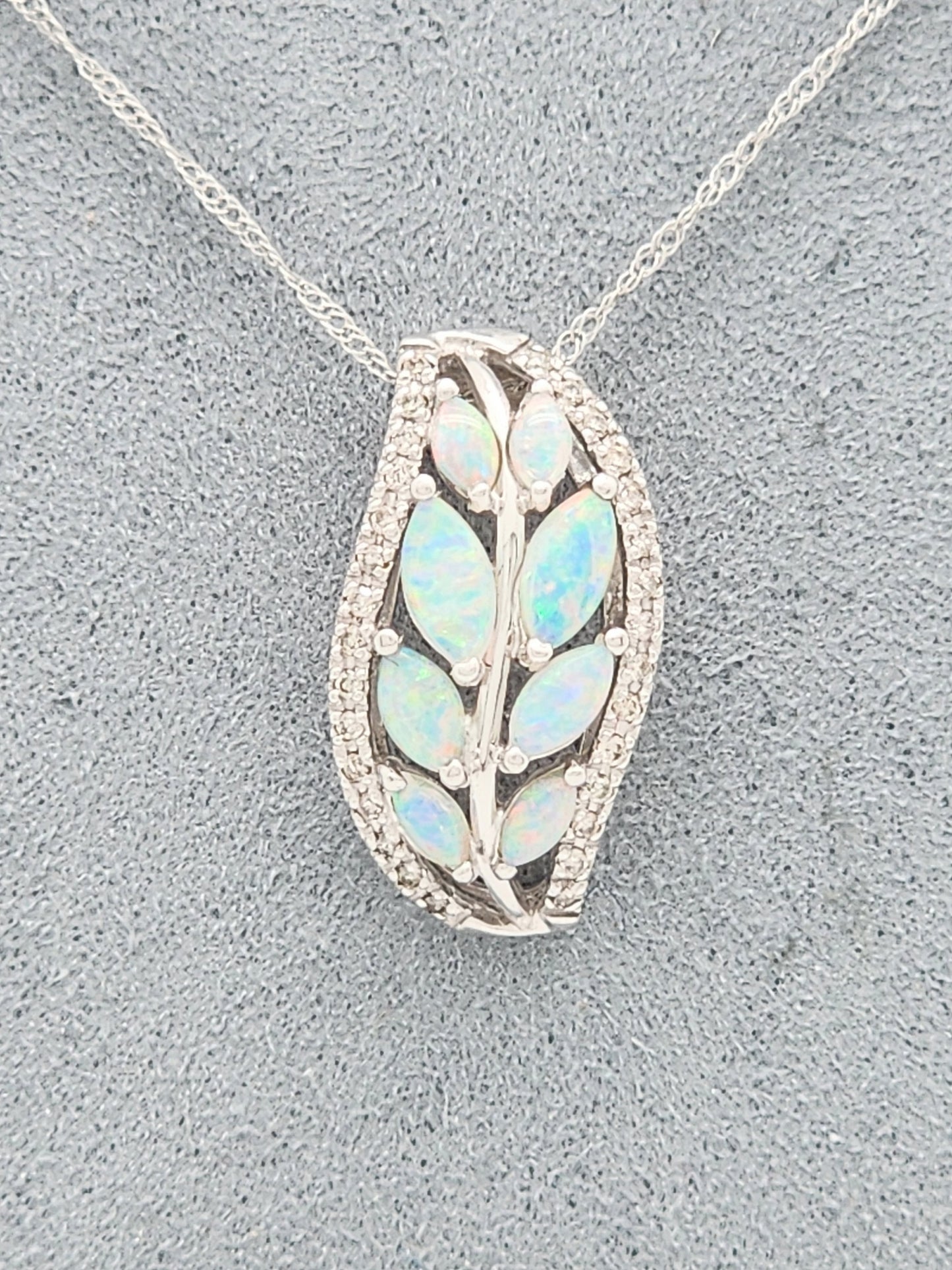 0.85 CARAT OPAL and DIAMOND PENDANT in 18KWG
