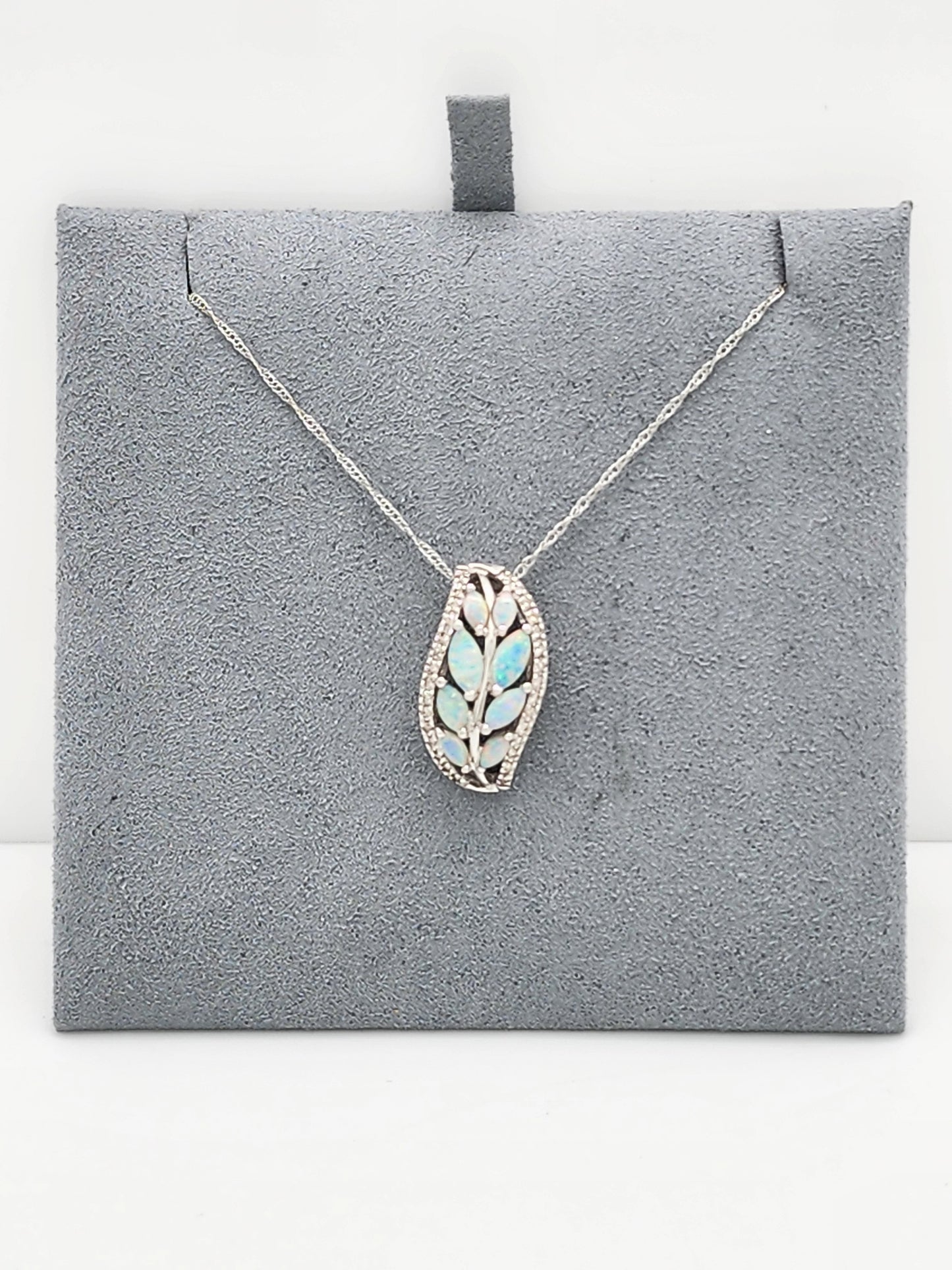 0.85 CARAT OPAL and DIAMOND PENDANT in 18KWG