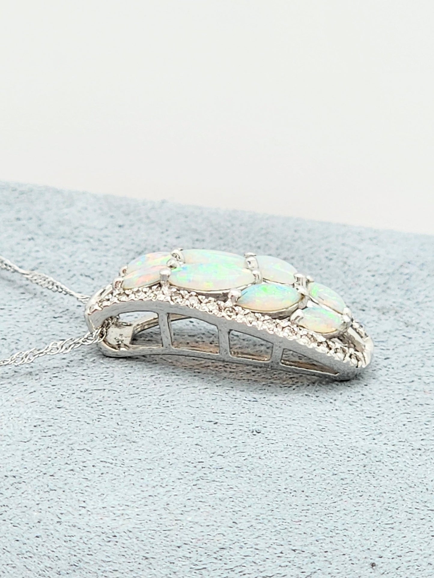 0.85 CARAT OPAL and DIAMOND PENDANT in 18KWG