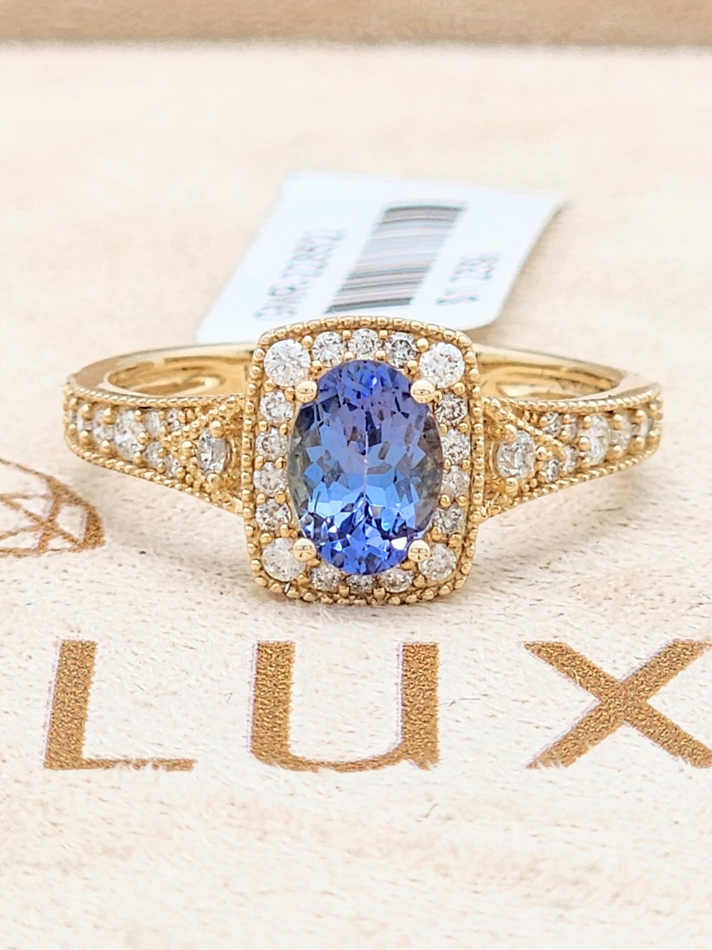 1.23 Total Carat Blue Sapphire and Diamond Halo Ring in 14KYG!