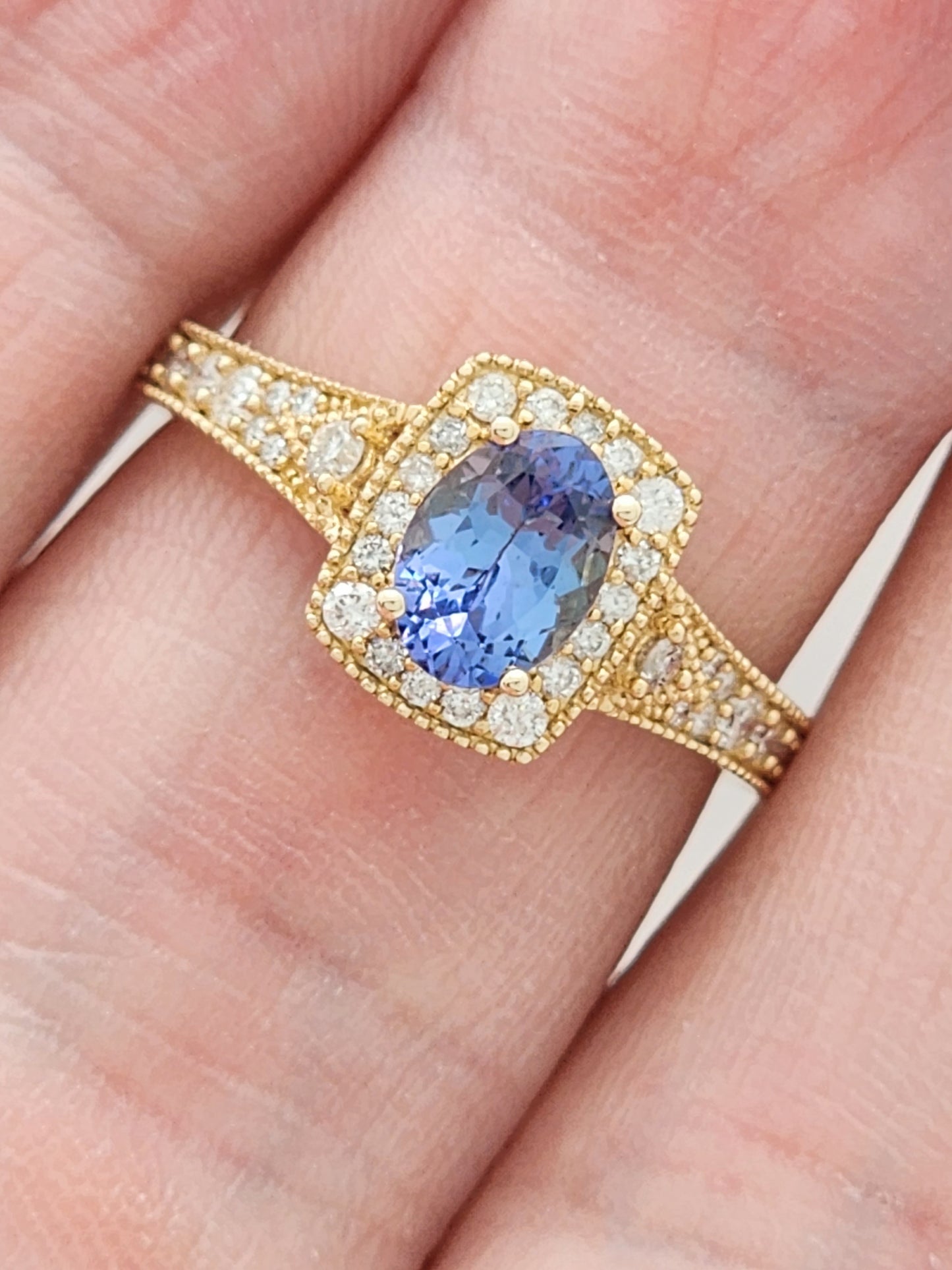 1.23 Total Carat Blue Sapphire and Diamond Halo Ring in 14KYG!
