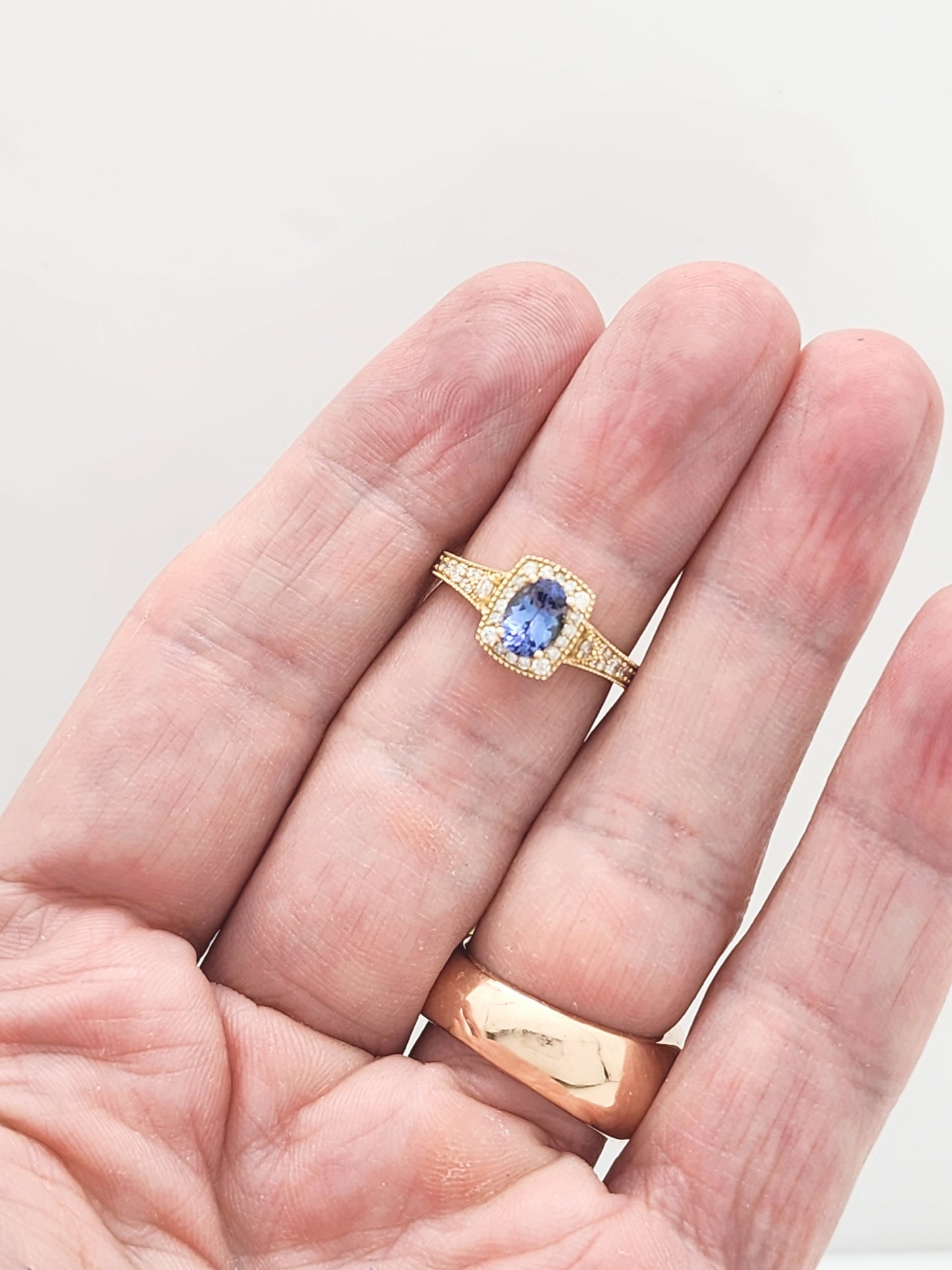 1.23 Total Carat Blue Sapphire and Diamond Halo Ring in 14KYG!