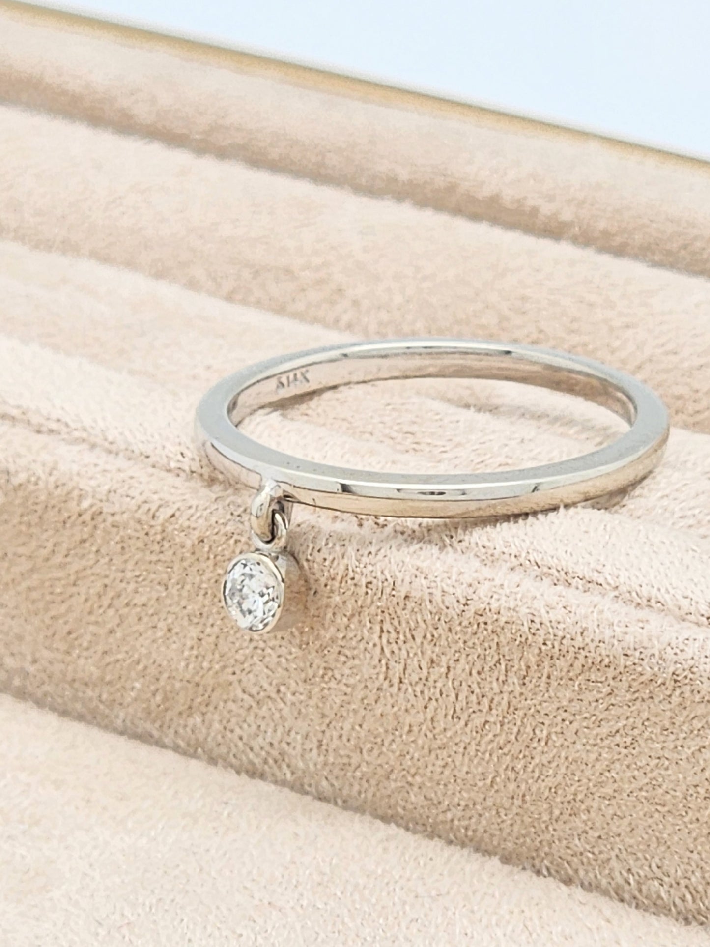 14KWG Band with Dangling .10 Carat Bezel-Set Diamond Size 7