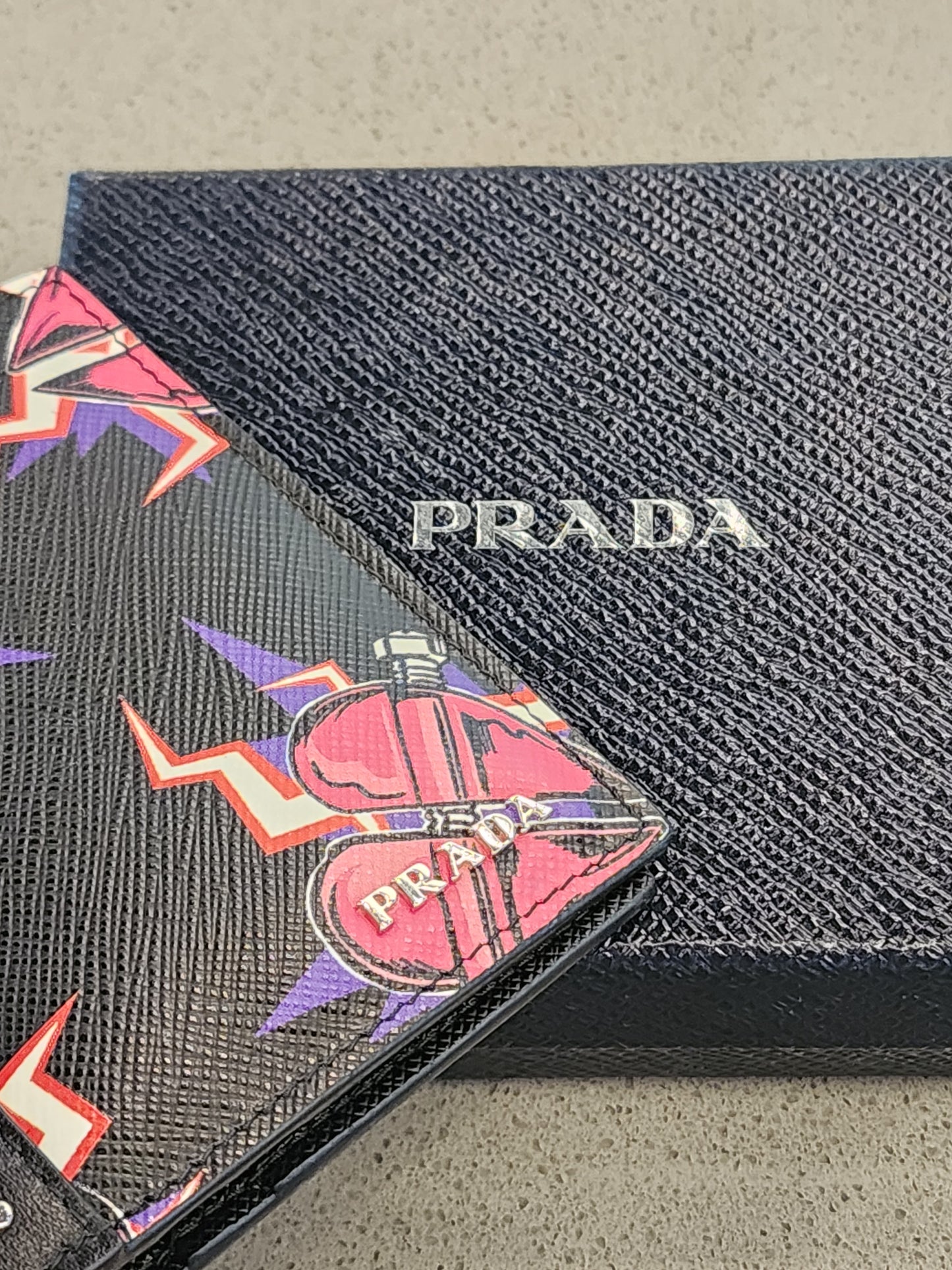 PRADA Saffiano Studded Heart Print Bi-Fold Wallet in Black Multi-Color