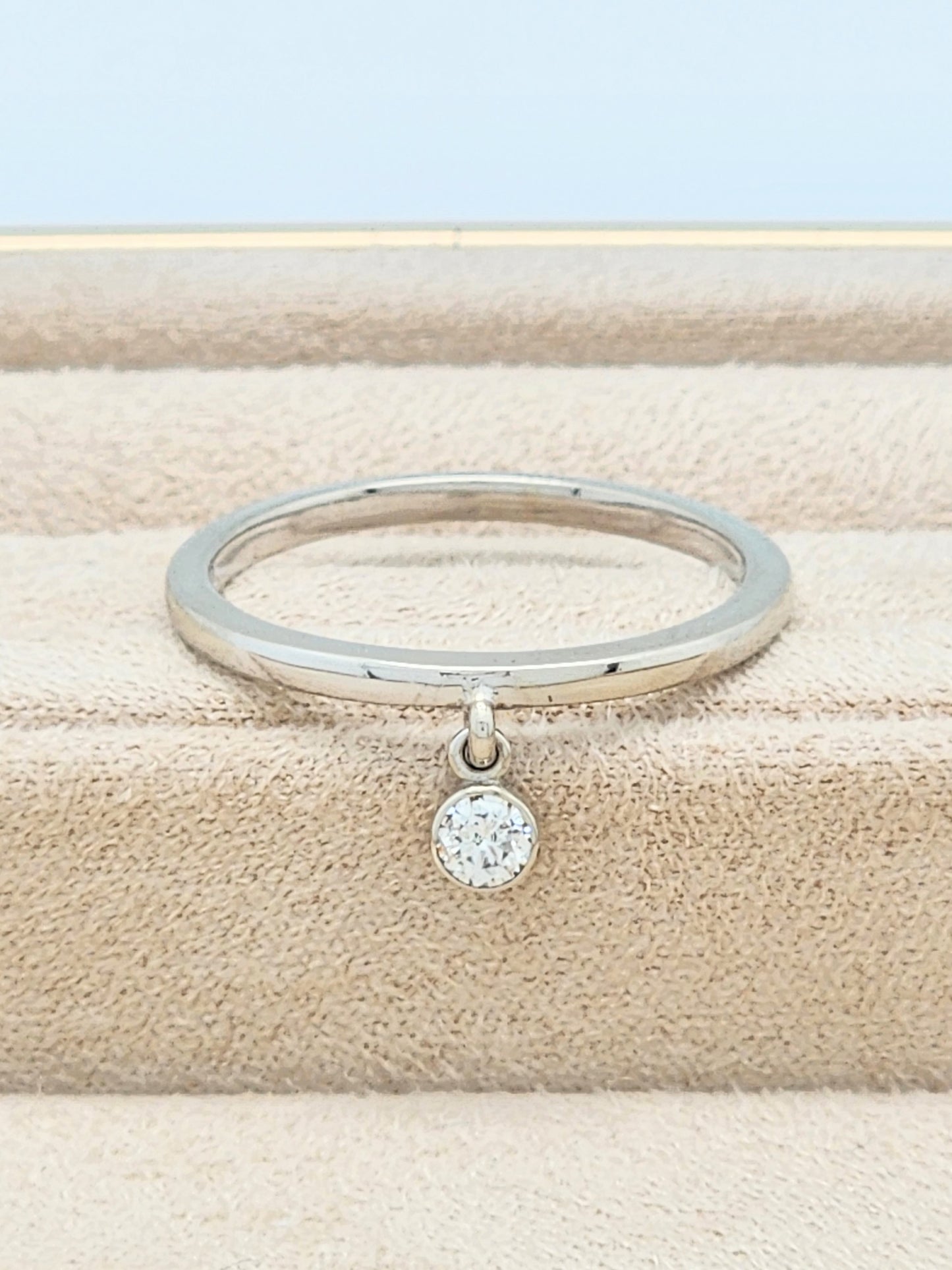 14KWG Band with Dangling .10 Carat Bezel-Set Diamond Size 7