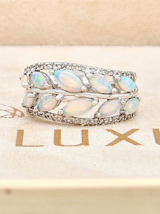 1.05 CARAT OPAL and DIAMOND RING in 18KWG